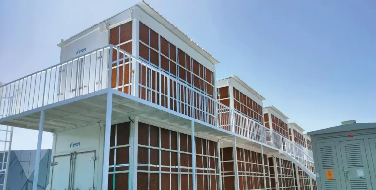 Stacked two-storey data containers with louvred façades
