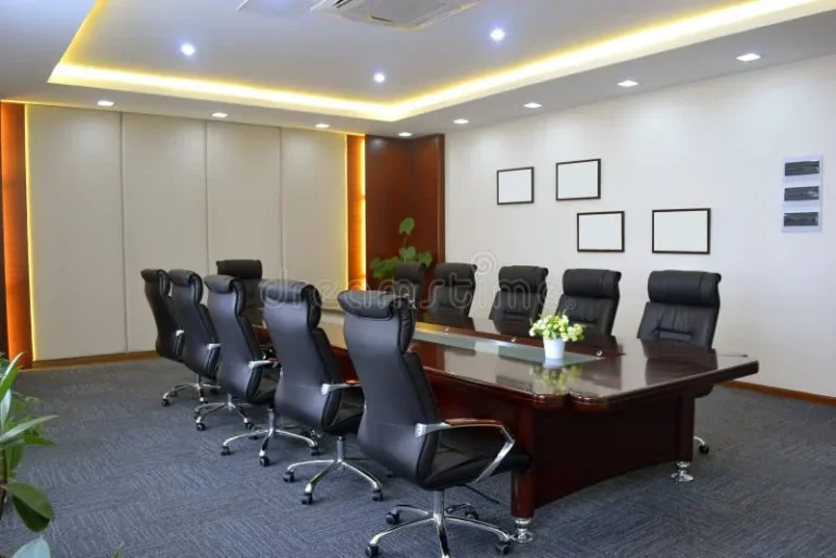 Boardroom with recessed cove lighting