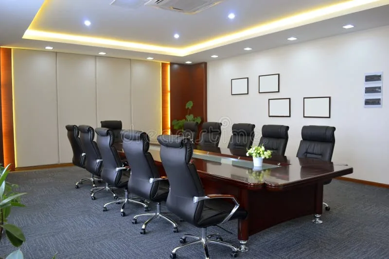 Boardroom with recessed cove lighting