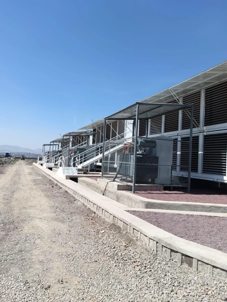 Data hall containers with access stairs at the BWP site in Ethiopia