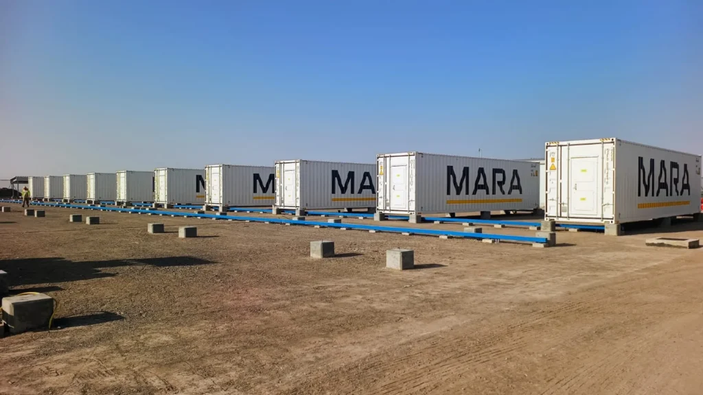 Line of compute containers at DEMA Energy, Ibri