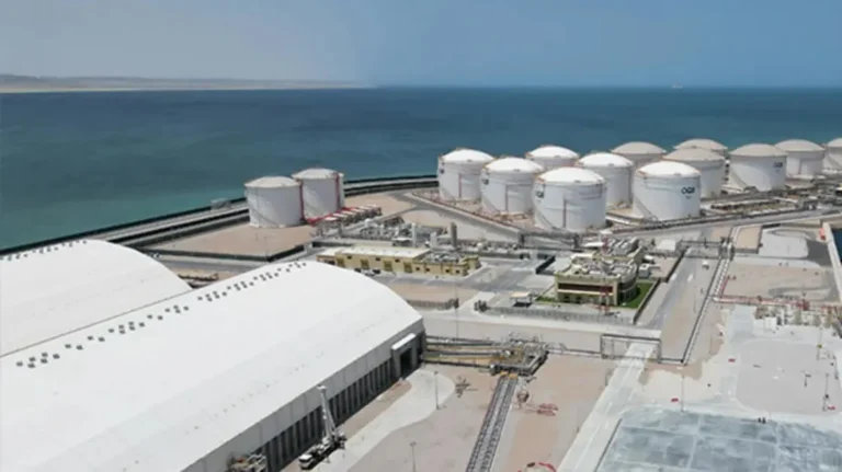 Duqm Refinery storage tanks and process units beside the sea